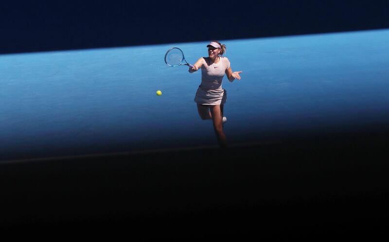 epa06442079 Maria Sharapova of Russia in action during her first round match against Tatjana Maria of Germany at the Australian Open Grand Slam tennis tournament in Melbourne, Australia, 16 January 2018.  EPA/MAST IRHAM