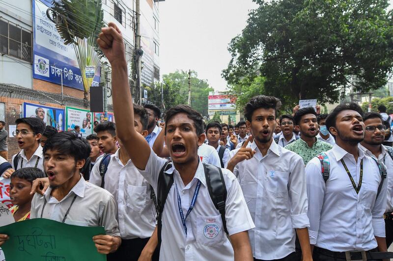 Bangladeshi students march along a a street during a student protest in Dhaka, following the deaths of two college students in a road accident .
Parts of the Bangladeshi capital ground to a halt for the seventh day running on August 4, as thousands of students staged protests calling for improvements to road safety after two teenagers were killed by a speeding bus.  AFP PHOTO / MUNIR UZ ZAMAN