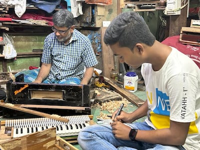 Craftsmen making the harmonium at Pakrashi & Co's workshop in Kolkata. Photo: Pakrashi & Co