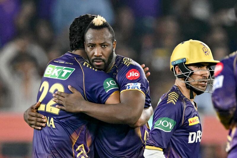 Kolkata Knight Riders' Andre Russell, centre, celebrates after he ran out Sunrisers Hyderabad's Rahul Tripathi. AFP
