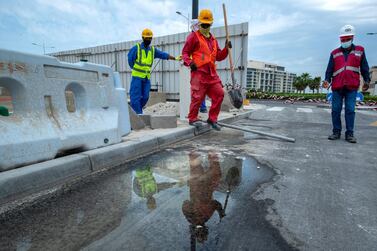 Puddles from the rainshowers on the roads in Saadiyat Island on Wednesday. Victor Besa / The National.