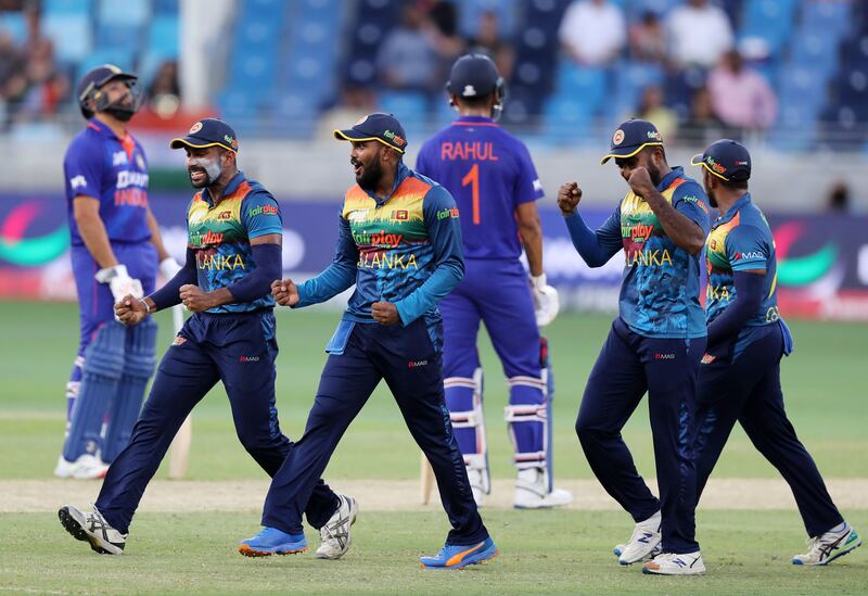 Sri Lanka players react as Sri Lanka's Maheesh Theekshana takes the wicket of India's KL Rahul. Chris Whiteoak / The National