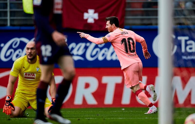 Messi celebrates after scoring against Eibar. AP Photo