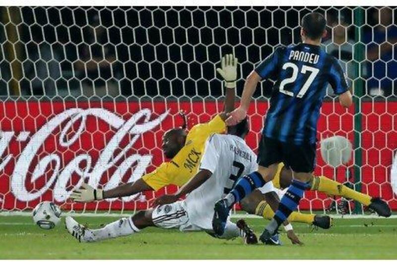 Inter Milan's Goran Pandev scores the opening goal against TP Mazembe at the Zayed Sports City.