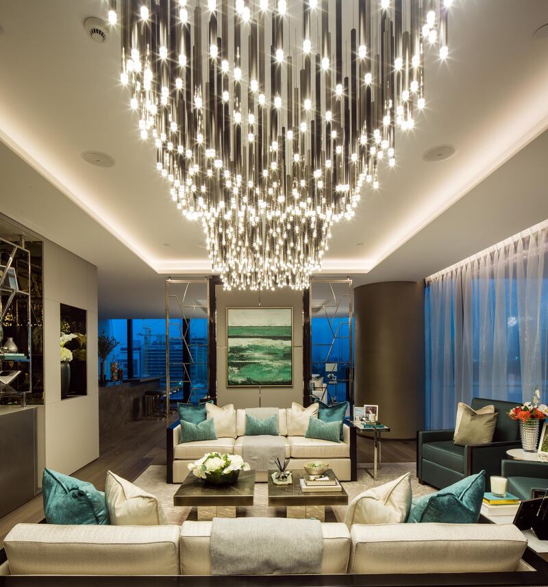 A lot of the furniture in One Palm's show apartment is bespoke. A magnificent chandelier that runs across the length of the living spaces and unifies them was designed by Elicyon. Antonie Robertson/The National