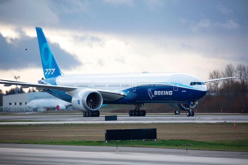 A Boeing 777X airplane taxis back after postponing its first flight due to weather, at Paine Field in Everett, Washington, on January 24, 2020. AFP