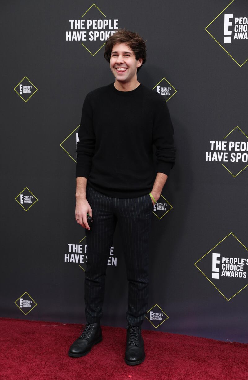 David Dobrik arrives at the 2019 People's Choice Awards in Santa Monica, California, on Sunday, November 10, 2019. Reuters