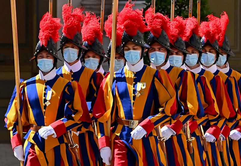 Swiss Guards await the arrival of European Commission President  Ursula von der Leyen at San Damaso courtyard in The Vatican for a private audience with the Pope. AFP