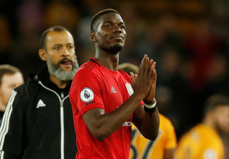 Pogba acknowledges United's fans on Monday. Reuters