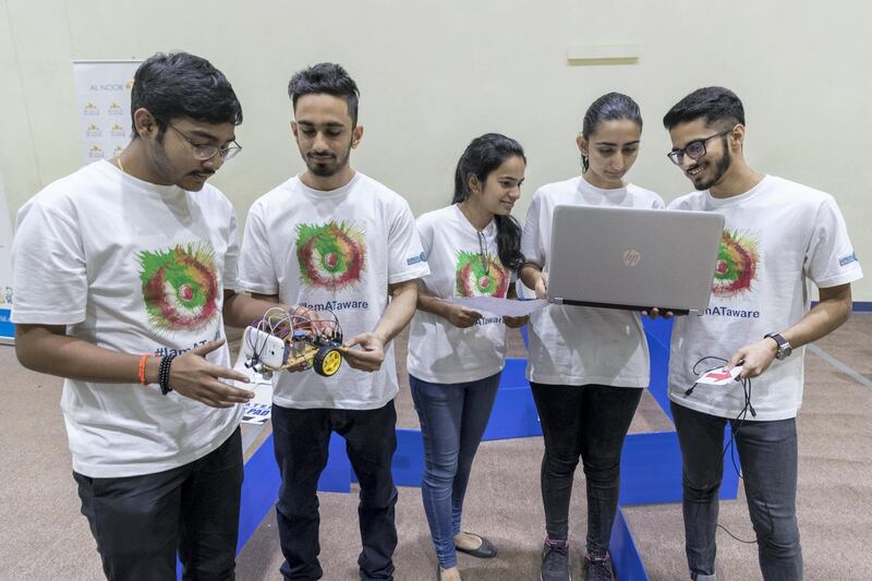 DUBAI, UNITED ARAB EMIRATES. 30 October 2017. Tech students come together to try and find solutions to help people with special needs move and communicate in the first assistive technology Hackathon organised by the Al Noor Special Needs Centre. LtoR: Team The Mediators, Rohit Vasu, Shaurya Sood, Arsheen Mir, Alina Zaidi and Rewant Verma from Bits Pilani Dubai Campus. (Photo: Antonie Robertson/The National) Journalist: Hala Khalaf. Section: Arts & Culture.