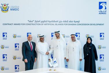 Dr Sultan Al Jaber, Adnoc Group chief executive, and Mohammed Al Rumaithi, Chairman of NMDC, shake hands after the signing of a Dh5bn contract to construct artificial islands in the Ghasha offshore concession. With them are Shaikha Salem Al Dhaheri, Acting Secretary General of Environment Agency – Abu Dhabi, right, Abdulmunim Al Kindy, Adnoc Upstream Executive Director, second right, and Yasser Zaghloul, NMDC CEO. Courtsey: Adnoc