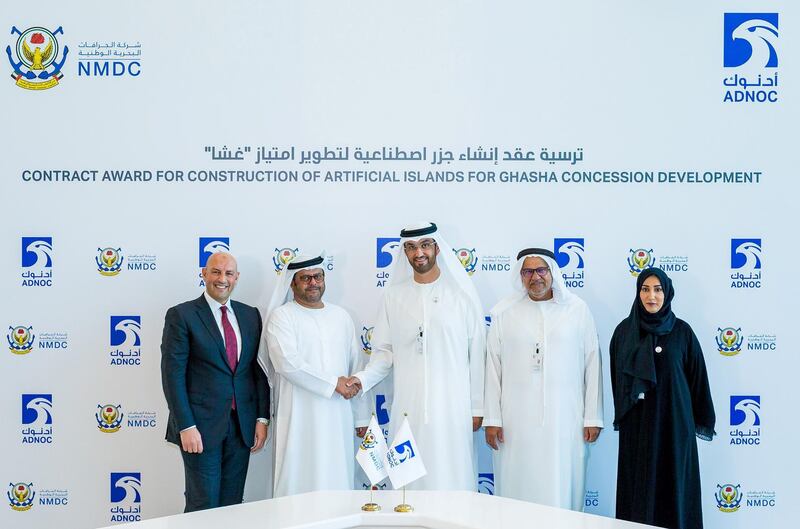 Dr. Sultan Ahmed Al Jaber, UAE Minister of State and ADNOC Group CEO and Mohammed Thani Murshed Al Rumaithi, Chairman of NMDC shake hands after ADNOC signs AED 5 billion contract to establish artificial islands in the Gasha offshore concession. Courtsey: Adnoc