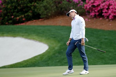 Rory McIlroy of Northern Ireland tilts his head on the 13th green during final round play of the 2018 Masters golf tournament at the Augusta National Golf Club in Augusta, Georgia, U.S. April 8, 2018. REUTERS/Mike Segar