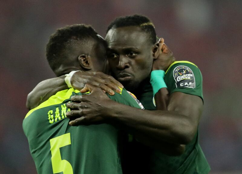 Senegal's Idrissa Gana Gueye and Sadio Mane celebrate after winning the penalty shoot-out in the Afcon final against Egypt. Reuters