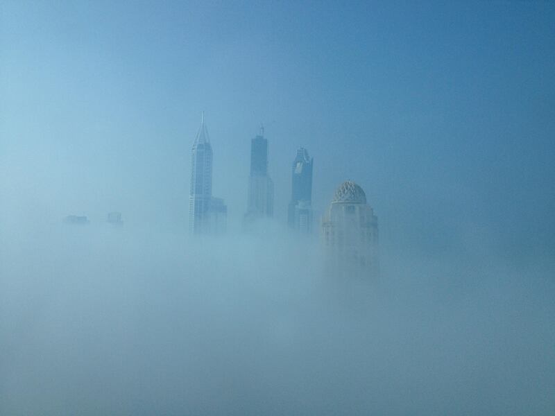 Skyscrapers in Dubai Media City barely visible in the heavy fog. Ben Flanagan