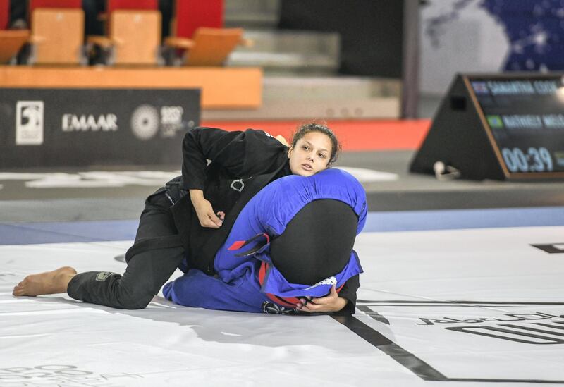 Abu Dhabi, United Arab Emirates - Nathiely de Jesus, defeats Samantha Cook at the Abu Dhabi Grand Slam championship in Jiu-Jitsu taking place in the Mubadala Arena. Khushnum Bhandari for The National