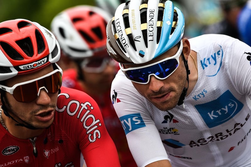 Anthony Turgis, left, and Pierre-Roger Latour of France ride during  last stage. AFP