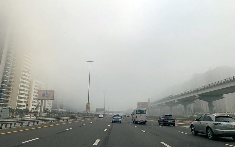 A layer of thick fog blankets Dubai early in the morning. Pawan Singh / The National