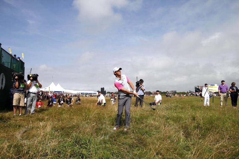 Rory McIlroy plays from the rough on the fifth hole during the final round on Sunday at the British Open en route to his title. Peter Muhly / AFP