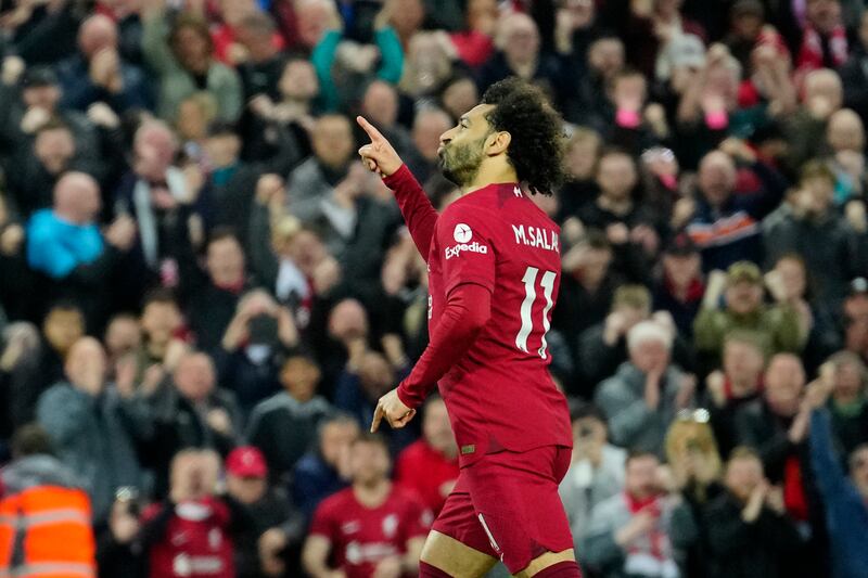 Liverpool's Mohamed Salah celebrates after scoring the opener. AP 