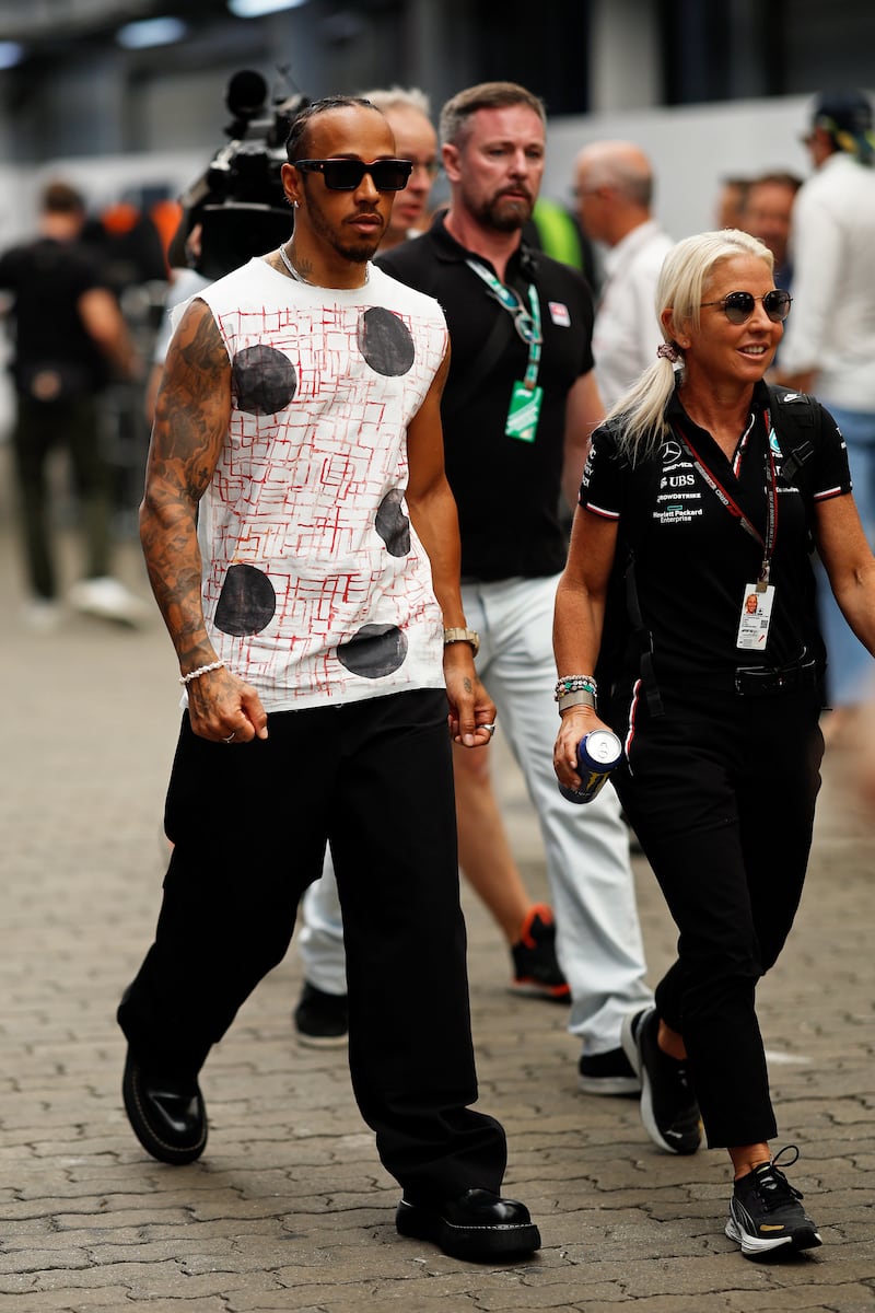 Lewis Hamilton, in a patterned tank top by Raf Simons, at the Brazilian Grand Prix in Sao Paulo. Getty Images