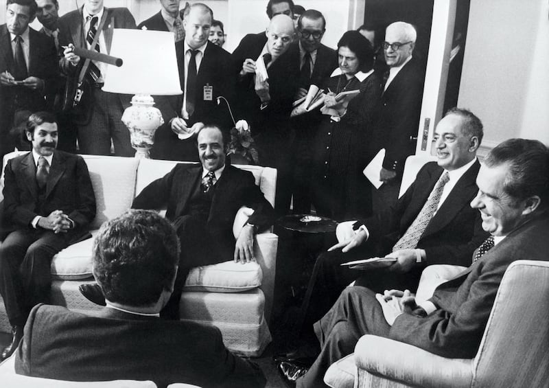 US President Richard Nixon (R) and Secretary of State of United States Henry Kissinger (back view) meet about the crisis in the Middle East with Arab Foreign Ministers (from left to right): Abdelaziz Bouteflika (Algeria), Sabah al-Ahmad al-Jaber al-Sabah (Kuwait), Omar Saqqaf (Saudi Arabia) on October 17, 1973 at the White House Oval Office in Washington, United States. (Photo by - / CONSOLIDATED / AFP)