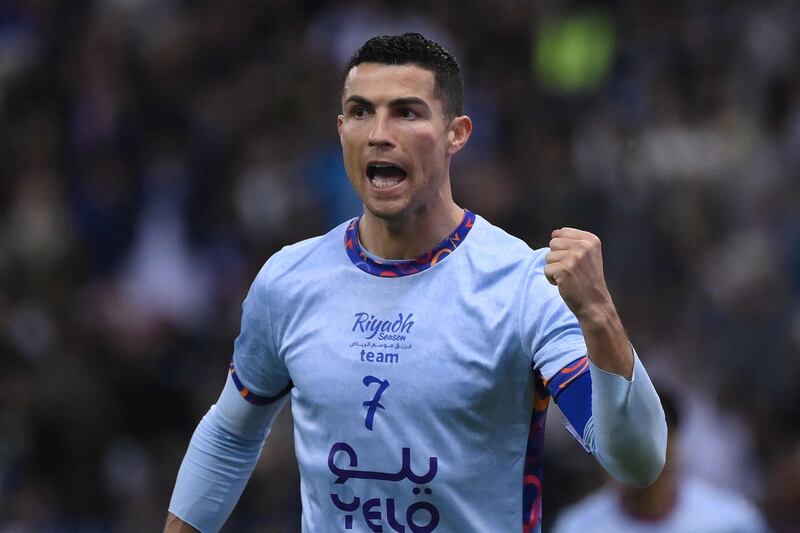 Cristiano Ronaldo celebrates his team's third goal. AFP