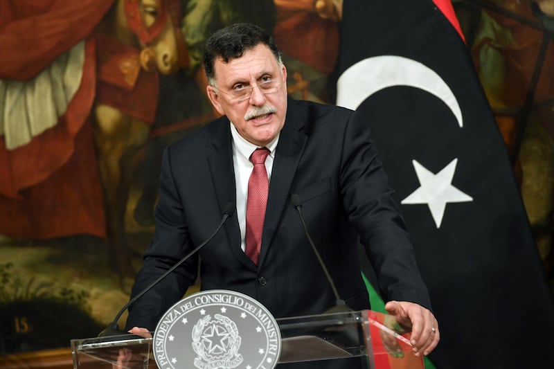 Libya's UN-backed prime minister Fayez Al Sarraj speaks addresses a joint press conference with Italian prime minister Paolo Gentiloni after their meeting at Palazzo Chigi in Rome on July 26, 2017. Andreas Solaro / AFP