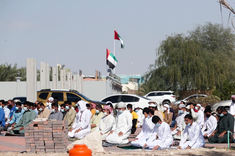 Friday prayers were held at 1.15pm at the Mosque of Omar ibn Al Khattab in Abu Dhabi, in line with the new working week.  Khushnum Bhandari / The National