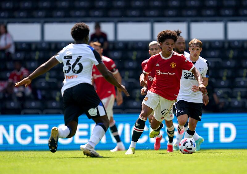 United's Shola Shoretire on the attack.