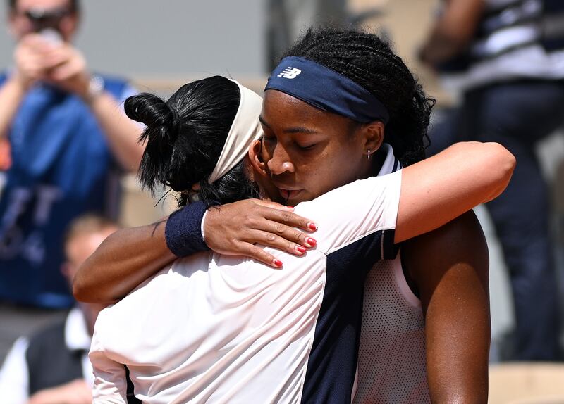 Coco Gauff hugs Ons Jabeur after their match. EPA
