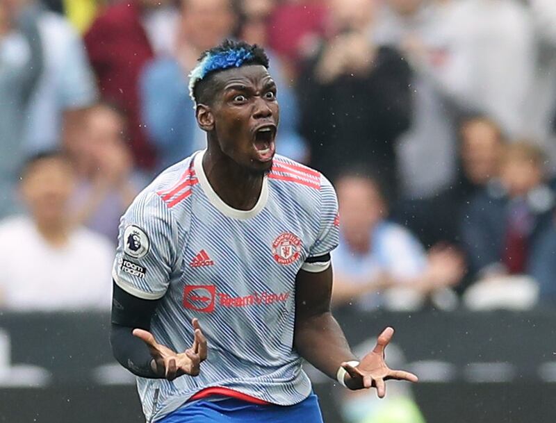 Manchester United midfielder Paul Pogba protests with the referee. Reuters