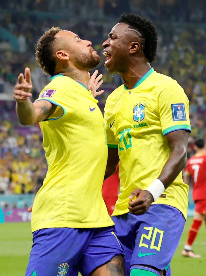 Neymar and Vinicius Junior celebrate after the opening goal. EPA