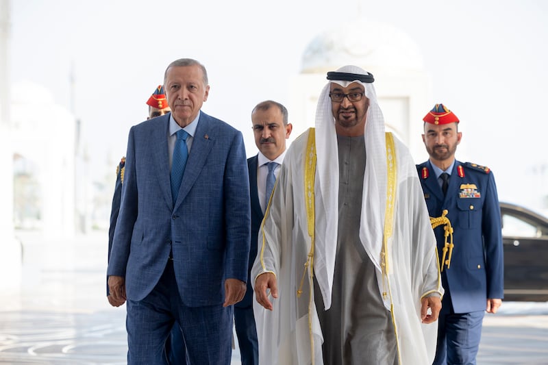 President Sheikh Mohamed walks with Mr Erdogan at Qasr Al Watan. Photo: UAE Presidential Court