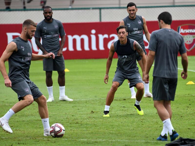 Ozil attends training session with teammates. AFP