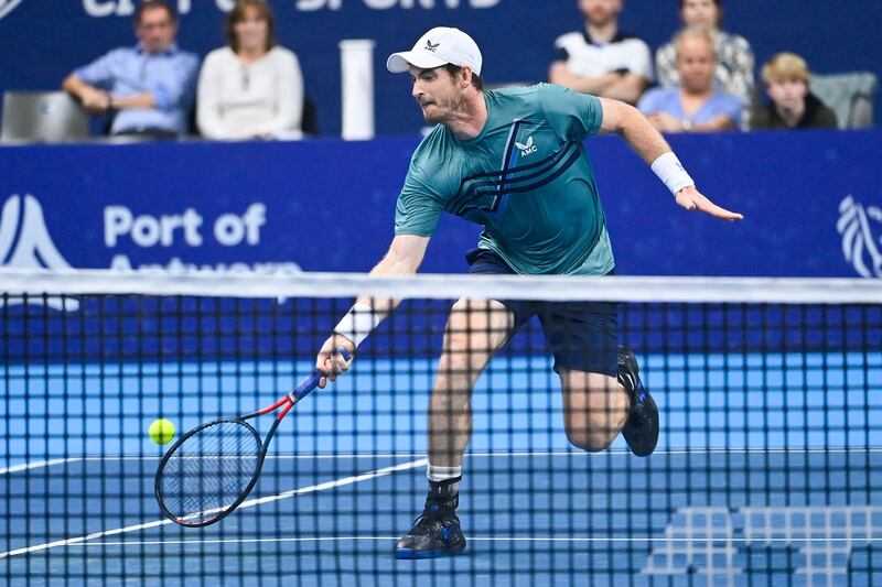 Andy Murray returns the ball during a match against Frances Tiafoe in the first round of the European Open. AFP