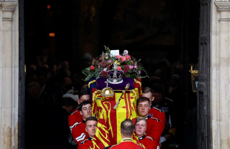 The coffin of Britain's Queen Elizabeth is carried out of Westminster Abbey on September 19. Reuters