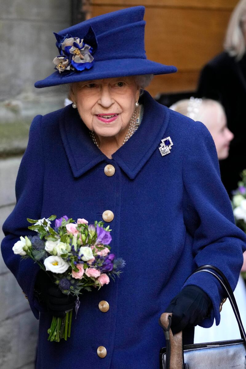 Queen Elizabeth II, wearing navy blue, attends a service of Thanksgiving to mark the centenary of The Royal British Legion at Westminster Abbey on October 12, 2021, in London. Getty Images