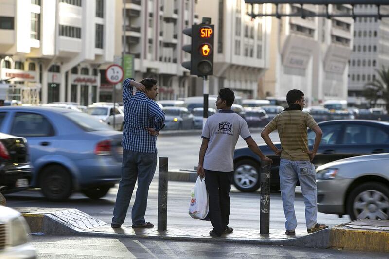 Countdown timers for vehicles, like those used at pedestrian crossings in Abu Dhabi, could improve traffic flow. Silvia Razgova / The National