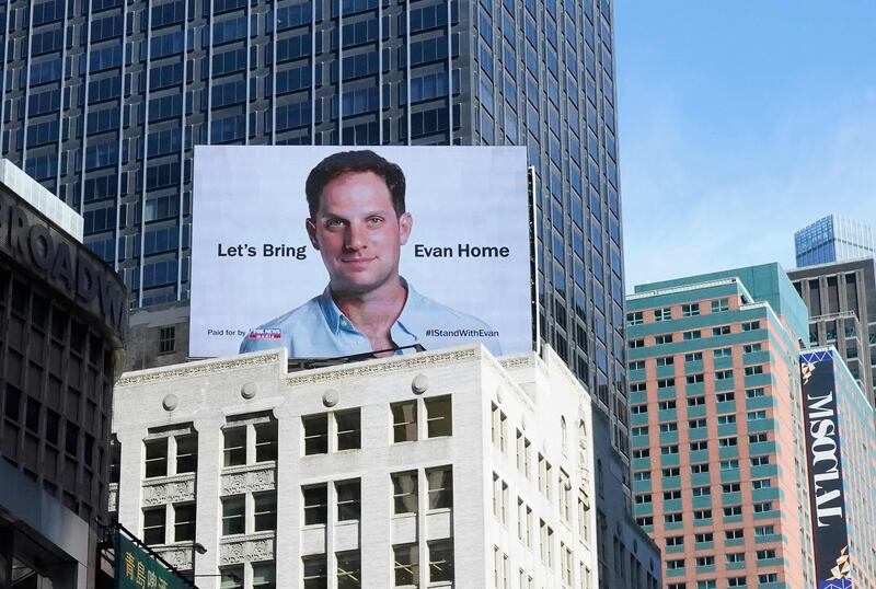 An electronic billboard at New York's Times Square marks the anniversary of the imprisonment in Russia of Wall Street Journal reporter Evan Gershkovich. AFP