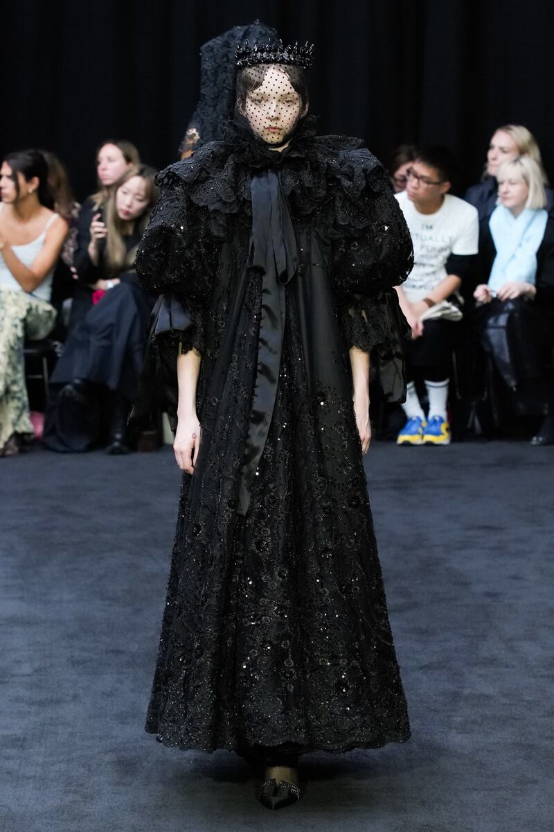 Richard Quinn's fitting tribute to Queen Elizabeth II - an all-black look topped with a crown. Photo: Richard Quinn