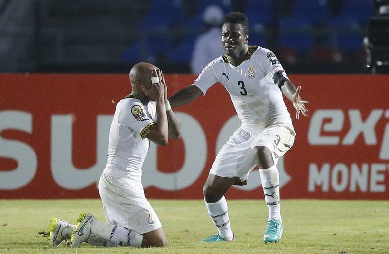 Andre Ayew, left, celebrates his winning goal against South Africa with teammate Asamoah Gyan during their 2015 African Cup of Nations Group C match in Mongomo on January 27. Mike Hutchings / Reuters