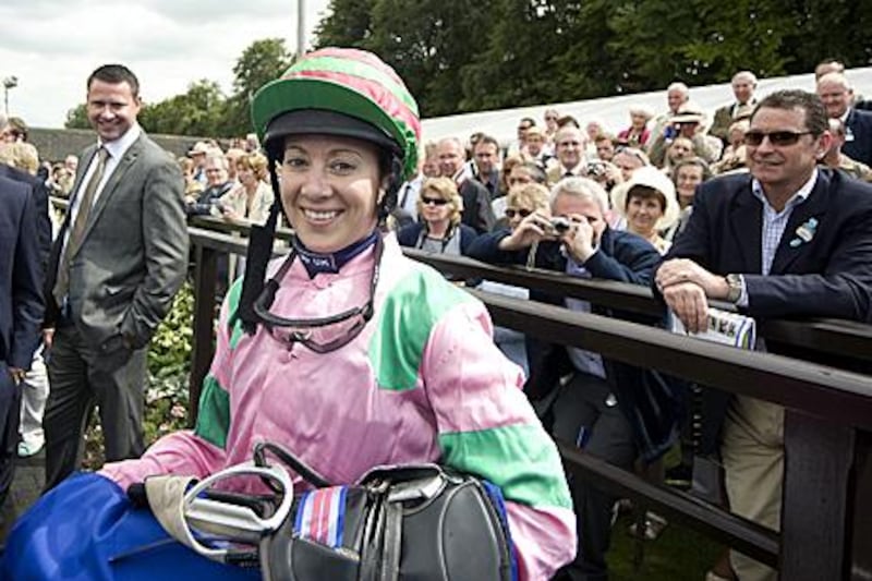 Hayley Turner smiles after her victory.