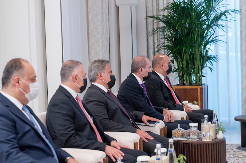 Members of King Abdullah's delegation during a meeting.