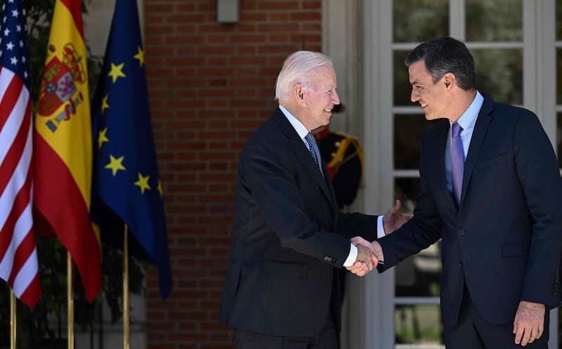 Mr Biden shakes hands with Prime Minister Sanchez of Spain at the Palace of Moncloa, in Madrid. AFP
