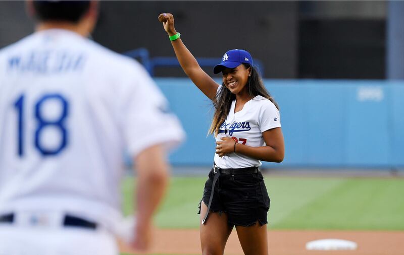 Osaka celebrates her pitch. AP Photo