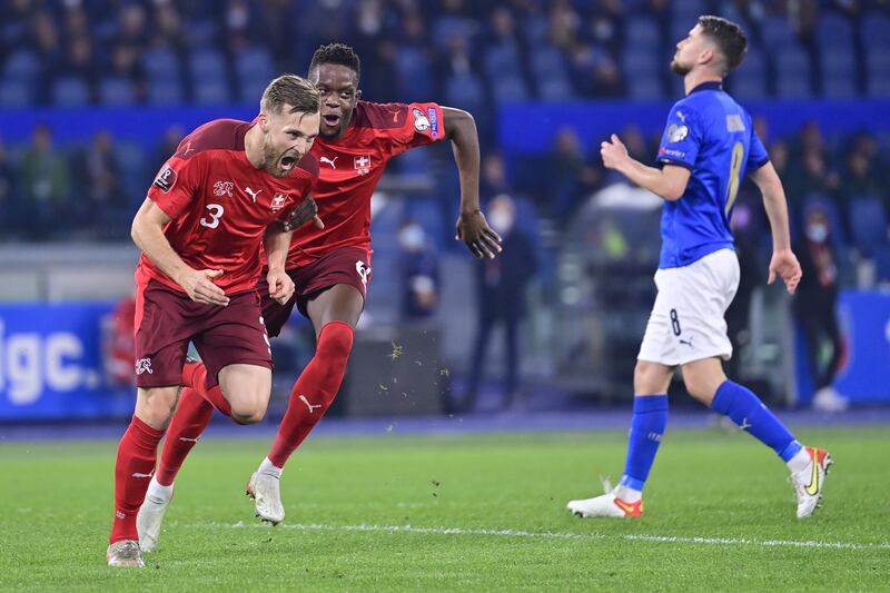 Switzerland defender Silvan Widmer celebrates scoring the opening goal. EPA