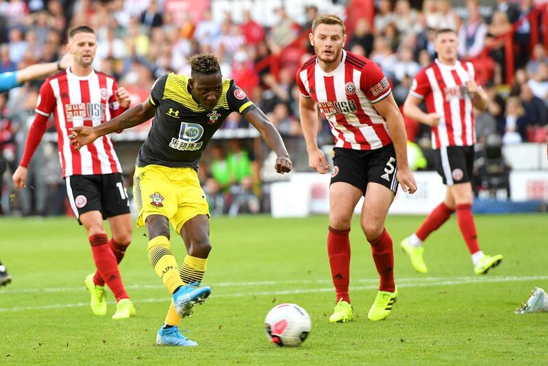 SHEFFIELD, ENGLAND - SEPTEMBER 14: Moussa Djenepo of Southampton scores his team's first goal during the Premier League match between Sheffield United and Southampton FC at Bramall Lane on September 14, 2019 in Sheffield, United Kingdom. (Photo by Ross Kinnaird/Getty Images)