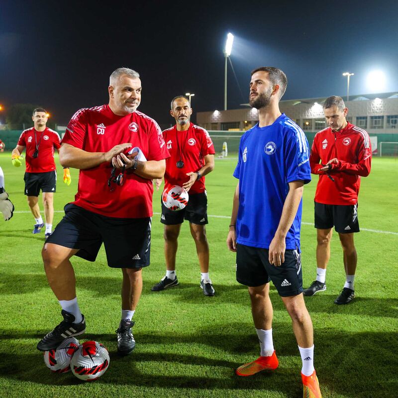 Miralem Pjanic talks to Sharjah manager Cosmin Olaroiu. Photo: Sharjah FC