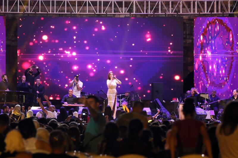 Lebanese singer and artist Carole Samaha sings in the historical citadel of Damascus during the Damascus Castle Festival, in Damascus, Syria, 13 July 2019.  Photo: EPA / Youssef Badawi